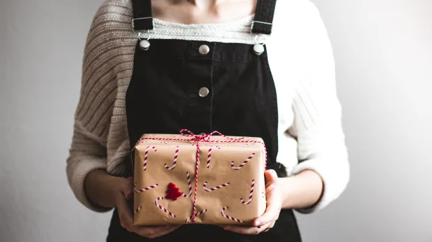 Woman giving a gift