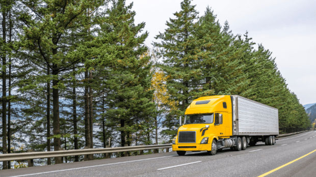 Commercial truck driving down highway